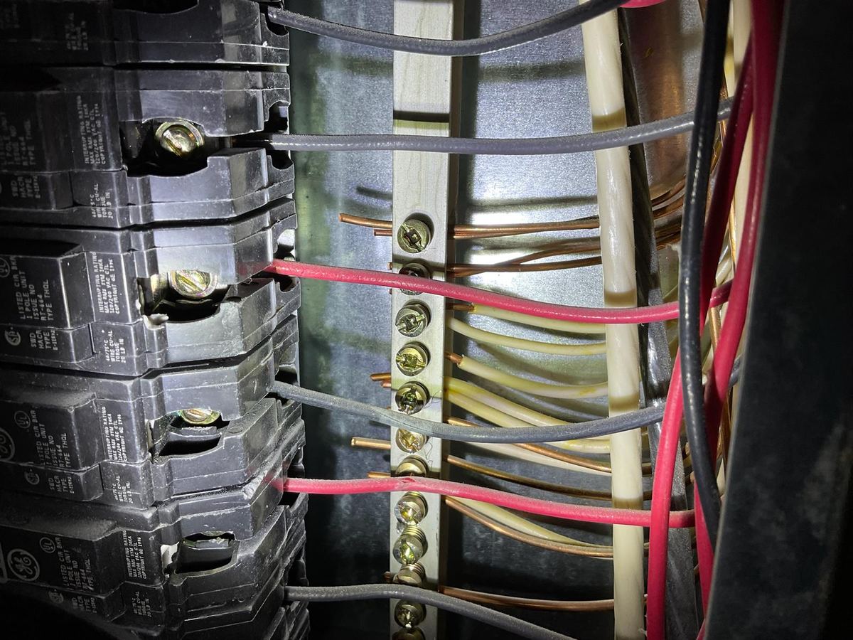 Interior of an electrical panel with conductors landed at the neutral bus bar